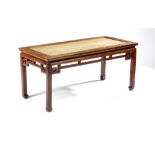 A CHINESE HONGMU RECTANGULAR BENCH, CHUNDENG LATE QING DYNASTY The centre enclosed within a mitred