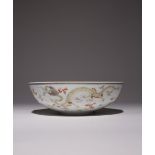 A CHINESE IRON-RED AND GRISAILLE-ENAMELLED 'DRAGON AND PHOENIX' BOWL QING DYNASTY Painted with a