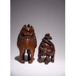 TWO CHINESE CARVED WOOD FIGURES OF A 'LUDUAN' AND AN OX LATE QING DYNASTY Each standing tall with