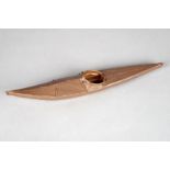 A Inuit model kayak Greenland wood, sealskin and paint, 34.5cm long. Provenance The Graham Turner