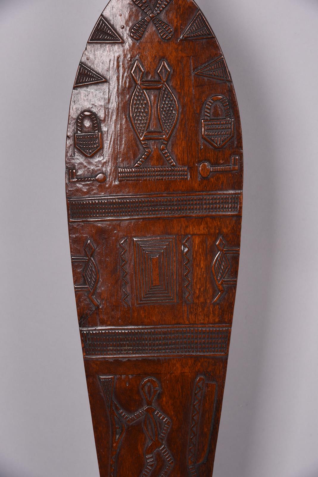 A Duala paddle Cameroon the blade with low relief carving of animals, padlocks, keys, scissors, - Image 4 of 5