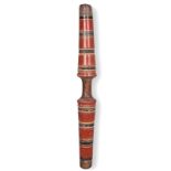 An Indian double ended pestle with ring turned and painted decoration, 71cm long.