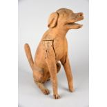 A Nicobar model of a seated dog Bay of Bengal with an open mouth and a yellow wash stain, 50cm high.