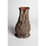 A cast of a Owo vessel plaster, decorated standing figures, animals and an elephant mask, 16cm high.