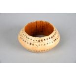 λA Democratic Republic of Congo bracelet ivory with four bands of punched circle and dot decoration,