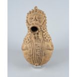 A Ganda spirit vessel Nigeria pottery, of bulbous form with relief decoration and a pair of arms,