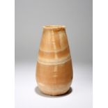 An Egyptian alabaster jar Late Period, circa 664 - 332 BC with a flat base, ovoid body and