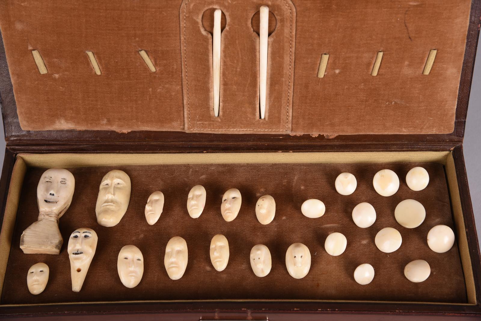 λA collection of Inuit buttons Alaska walrus ivory, including seven carved with human faces, three - Image 2 of 4