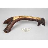 An Inuit cribbage board antler with copper wire inlay to the top, the end pierced for pegs and