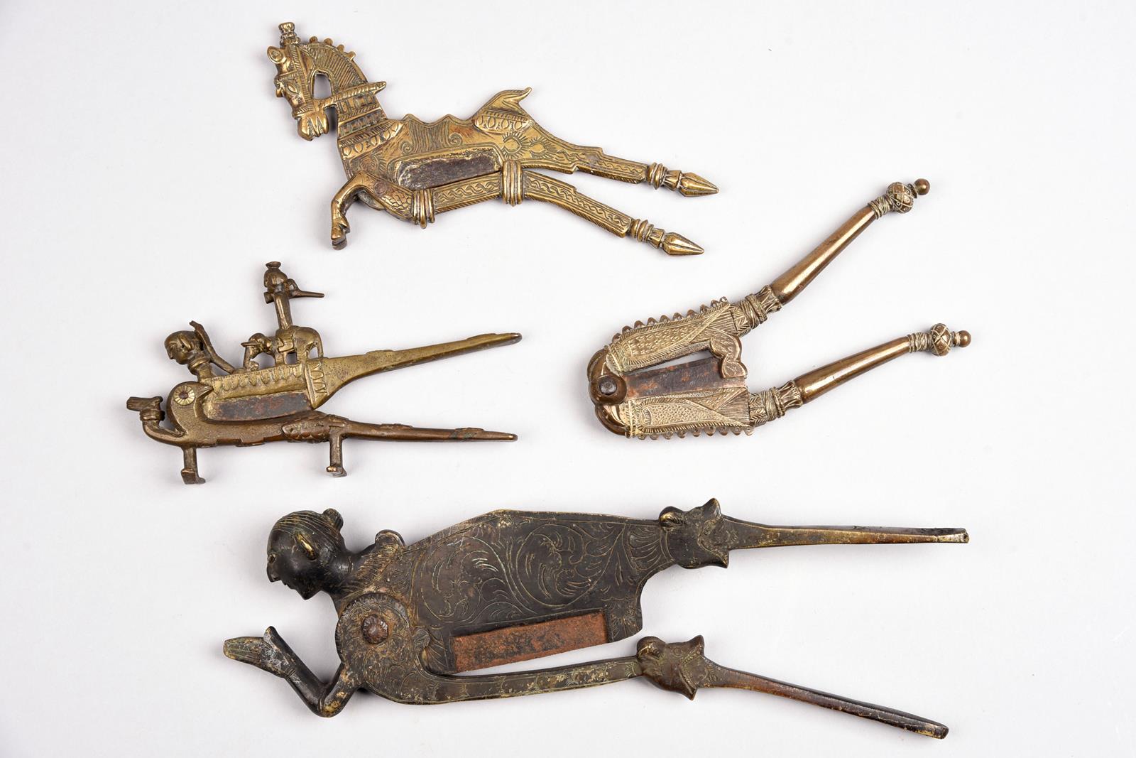 Four South Asian betel nut cutters India and Sri Lanka brass and steel, including a Tamil Nadu