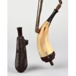 A Kamba snuff horn Kenya horn, wood, aluminium, copper wire and brass chain, with stopper, 23.5cm