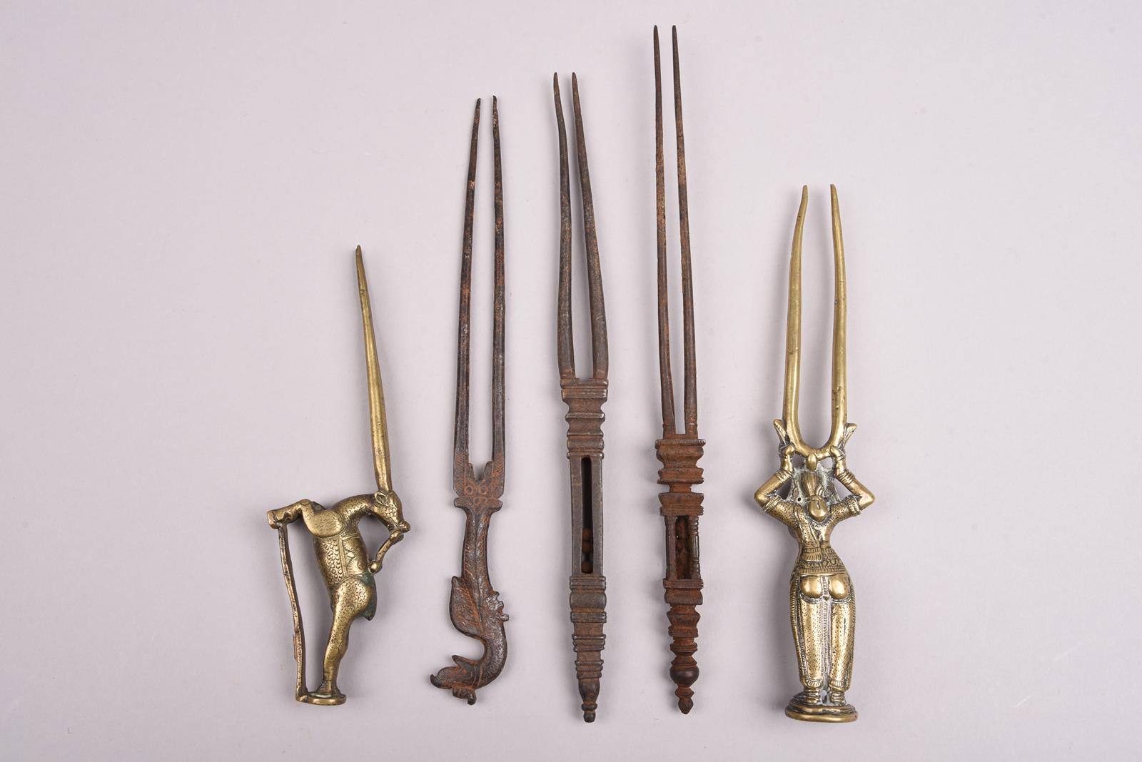 Five Indian hairpins brass and steel, all with two prongs, including a standing female figure, a - Image 3 of 4