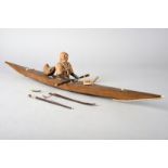 λAn Inuit model kayak Greenland wood frame with sealskin, gut and marine ivory mounts, with a half