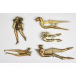 Five South Asian betel nut cutters India and Sri Lanka brass and steel, including a Deccan hamsa,