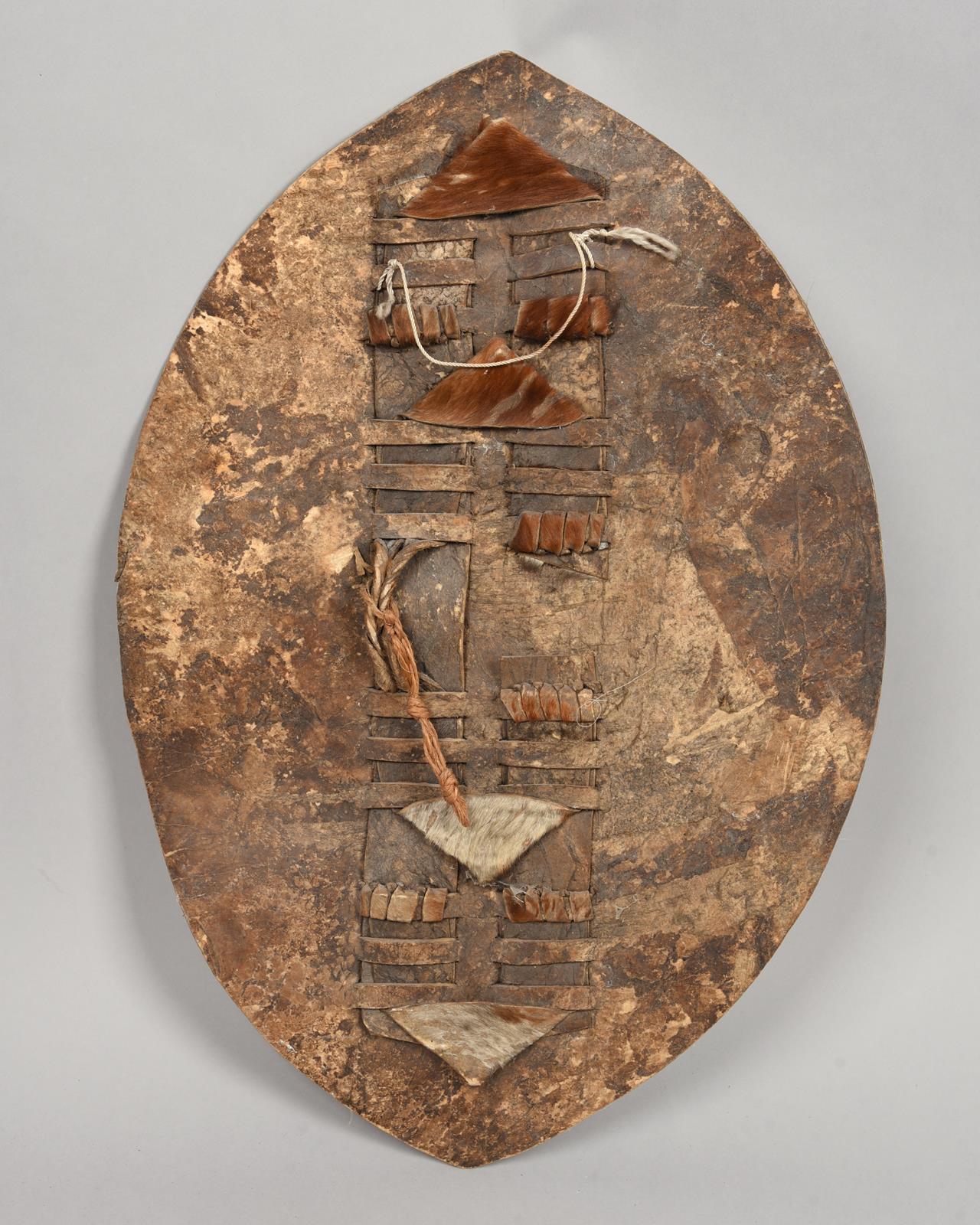 A Zulu shield South Africa cow hide, 69 cm high, two Zulu stabbing spears iklwa, with iron blades - Image 3 of 4