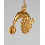 An Ashanti gold pendant Ghana, late 19th / early 20th century cast as a mudfish with fine