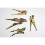 Four South Asian betel nut cutters India and Sri Lanka brass and steel, including a Kandyan figure