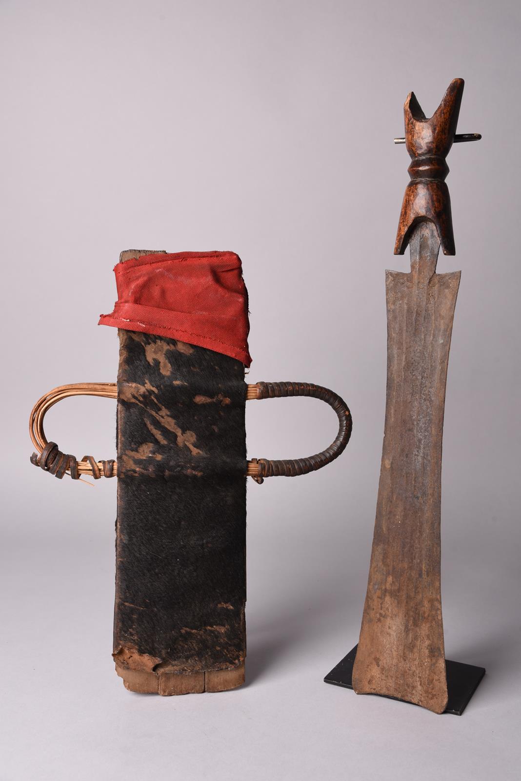 A Tikar knife Cameroon with a fullered blade and carved wood handle, in a hide and cloth covered - Image 2 of 2