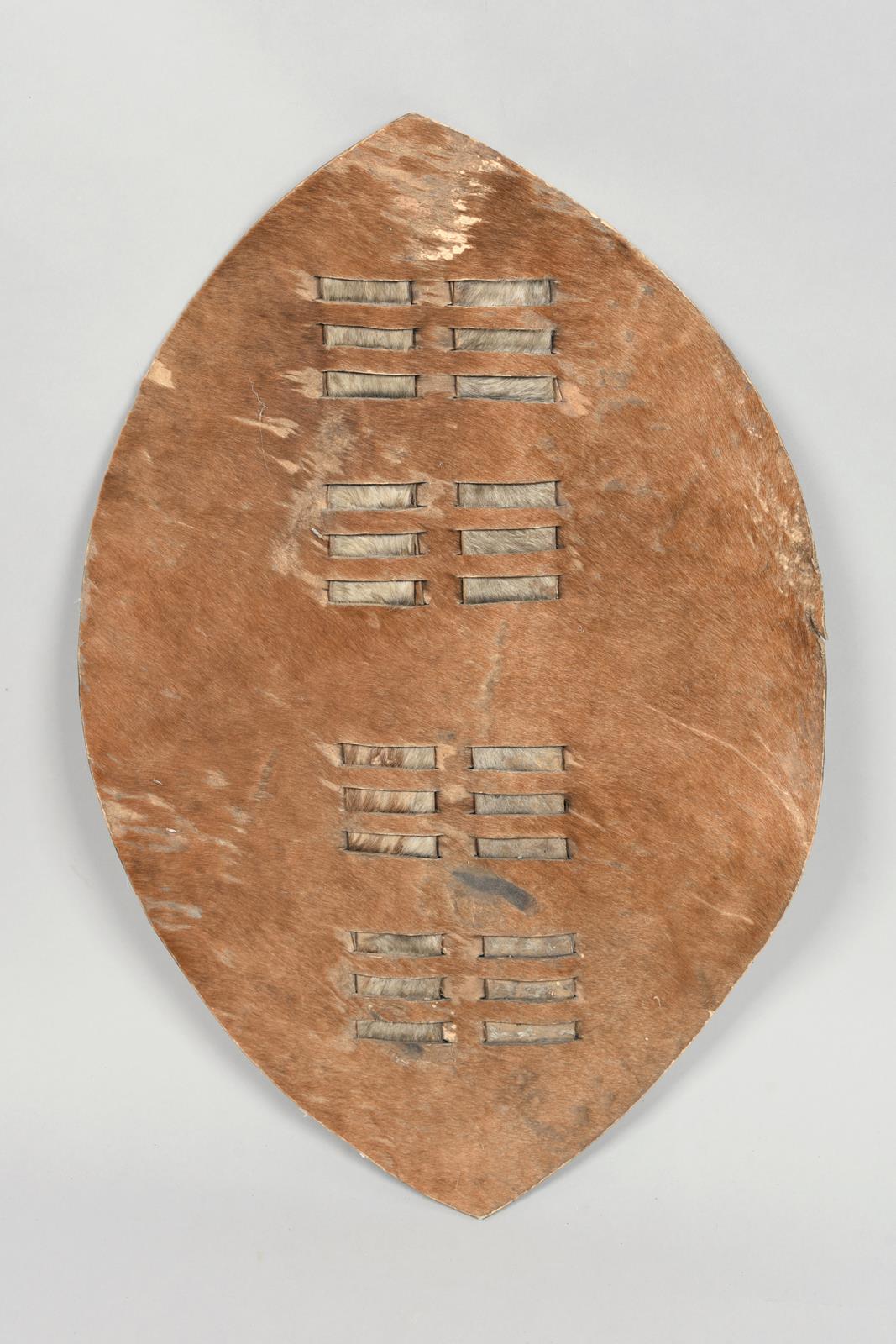 A Zulu shield South Africa cow hide, 69 cm high, two Zulu stabbing spears iklwa, with iron blades - Image 2 of 4