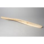 An Inuit knife Arctic whalebone, 86cm long. Provenance The Graham Turner Collection.