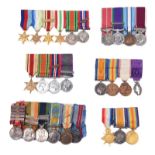 A collection of dress miniature medals mounted in groups, comprising: six: QSA (5 clasps), KSA (2