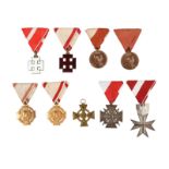 Austria: a collection of awards, comprising: Order of Merit 6th Class, gilt bronze and red enamel