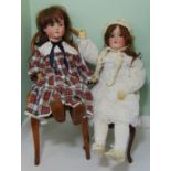 2 German bisque head dolls with jointed composition bodies; taller doll height 78cm has closing