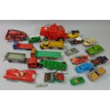 Unboxed model vehicles including Dinky Lawn mower, various Dinky trucks, a Triang Minic