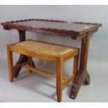An Arts & Crafts style oak occasional table of rectangular form with pie crust moulded edge,