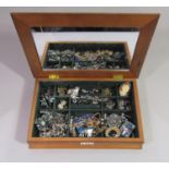 Collection of costume jewellery to include a silver niello bracelet, contained in a wooden jewellery