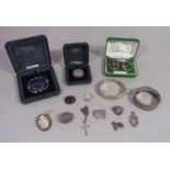 Mixed lot of silver / white metal jewellery to include a Pekingese dog brooch, two hinged bangles