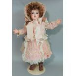 Bisque head doll with faint Jumeau makers mark and number '8' in red; fixed blue eyes, closed mouth,