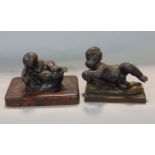 Bronze study of a recumbent child 11 cm long, together with a cast metal study of a baby upon a