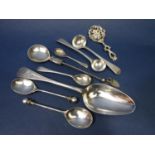 A mixed collection of silver spoons comprising a pair of Arts & Crafts silver teaspoons by