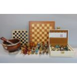 Boxwood carved chess set in the manner of Staunton, height of King 9.5 cm, together with a further