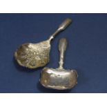 George III silver engraved caddy spoon, the serpentine bowl with floral engravings, maker John