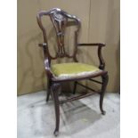 An Edwardian drawing room chair with carved and pierced splat, with inlaid detail in brass, with