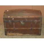 A vintage wooden canvas steel and timber lathe bound domed top cabin trunk with stitched leather