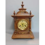 A late 19th century Wurttemberg 14 day striking mantle clock, the case with applied brass mounts sat
