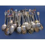 A large collection of silver and white metal souvenir and collectors spoons, 10 ozs approx