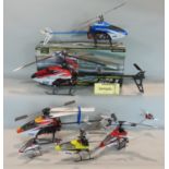 Three boxes containing a large quantity of remote controlled helicopters and other vehicles (a
