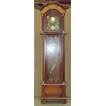 A reproduction longcase clock with arched dial and battery movement