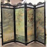 An aesthetic period four fold room divider of full height, the ebonised framework with repeating