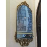 Three gilt framed wall mirrors of varying size and design