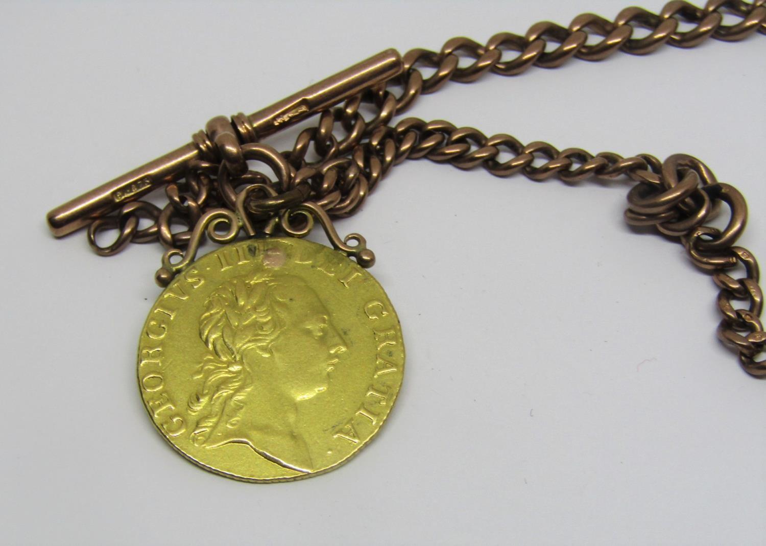 9ct Albert chain with T-bar, hung with a George III 1761 guinea, 38.5g - Image 2 of 2