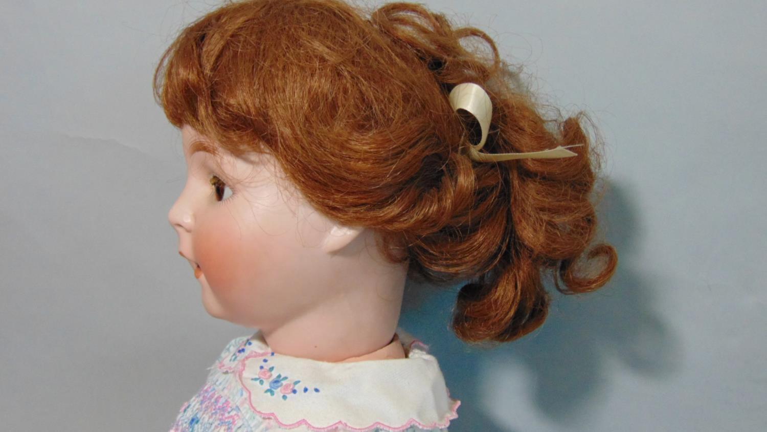 Schoenau & Hoffmeister bisque head baby doll with brown closing eyes, open mouth with teeth, brown - Image 4 of 4