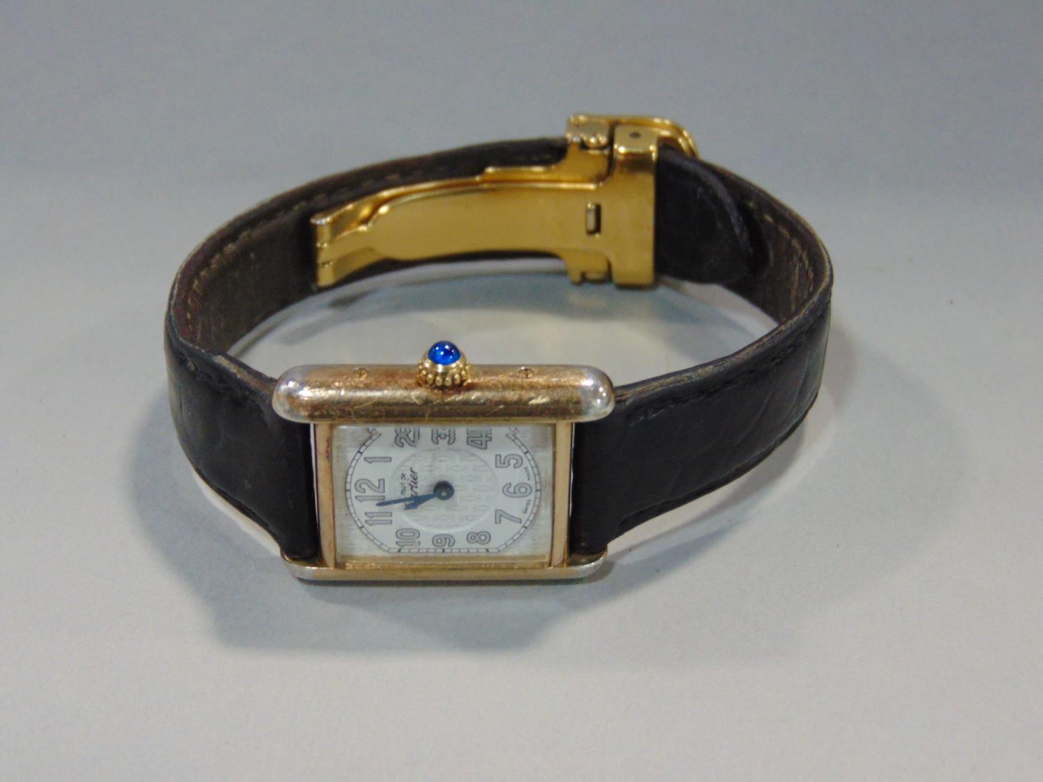 Vintage ladies Must De Cartier silver gilt tank dress watch, the square dial with textured detail