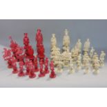 A good quality 19th century Canton ivory concentric ball figural chess set, the pieces upon