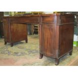A Regency mahogany pedestal sideboard, the central frieze drawer flanked by two bow fronted