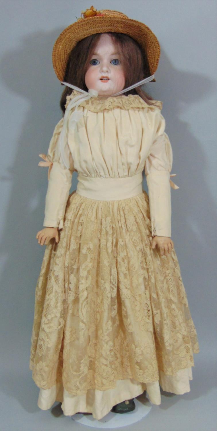 Early 20th century Armand Marseille doll with stand, mold 370 with bisque shoulder-head, kid body